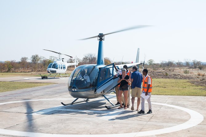 Helicopter Scenic Flight over Victoria Falls 12-13 minutes Flight - Extra charges, pickup areas, and booking details