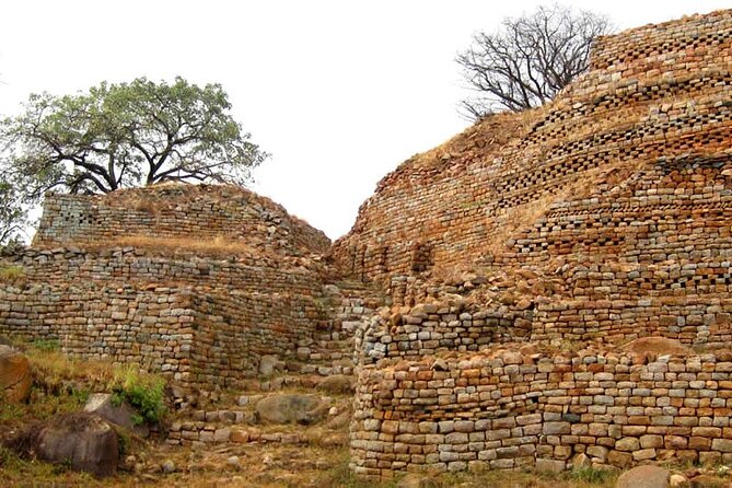 Khami Ruins & Matopos Silunguzi Village Day Tour! - Khami Ruins, stone walls and a Portuguese Cross