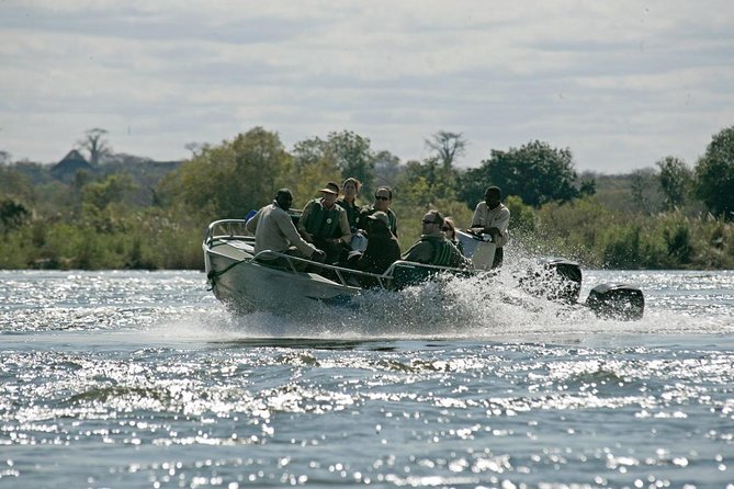 Livingstone island Morning Breezer ( swim above the falls) - The boat ride through the Zambezi channels