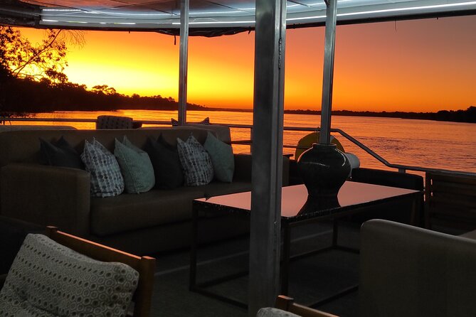 Luxury Sunset River Cruise on the Zambezi - The sunset between Zimbabwe and Zambia