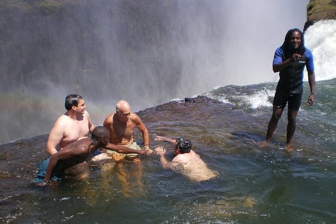 Small-Group Devil's Pool and Livingstone Island Tour - Walking the rocks to Devil’s Pool