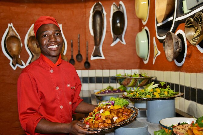 The Boma Dinner, Dance And Drum Show In Victoria Falls - The hand-washing ceremony and local brew