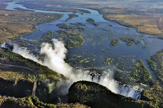 Victoria Falls Guided Tour with Hotel Pickup - The real cost: $20 plus the entrance fee