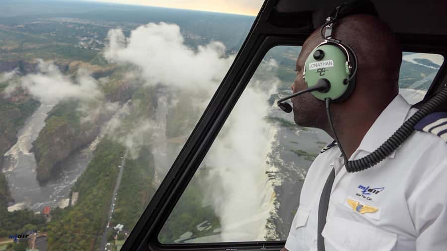 Victoria Falls: Helicopter Tour with Hotel Pickup - Timing, weather, and your day