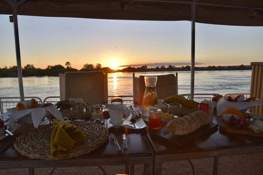 Victoria Falls: Sunrise Cruise on the Zambezi River - Before dawn at Victoria Falls