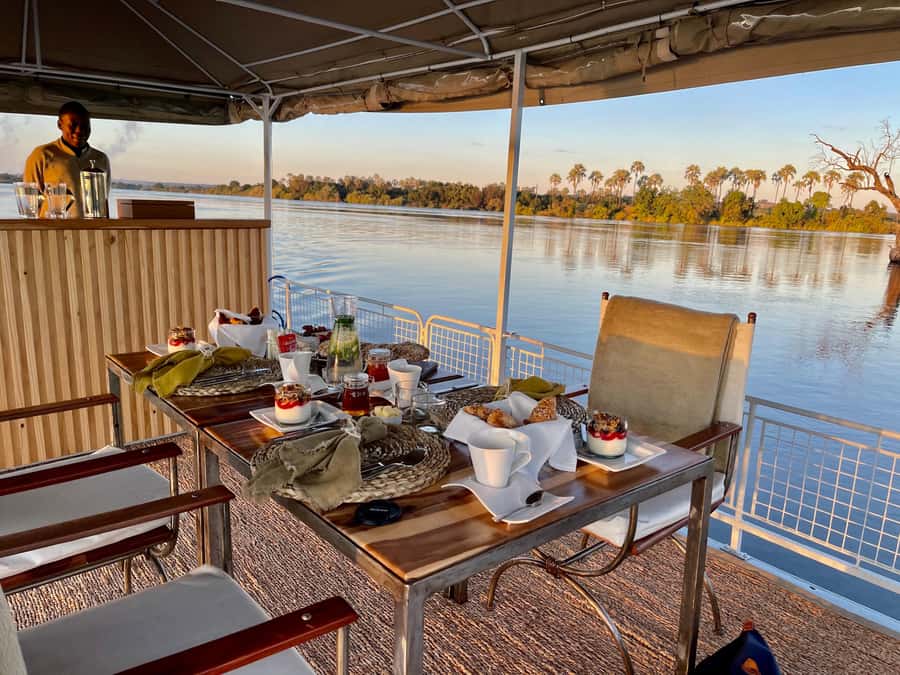 Victoria Falls: Sunrise Cruise on the Zambezi River - Breakfast with the river in front of you