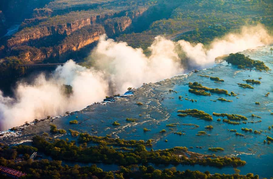 Victoria Falls Sunrise Photography Tour - Photographing water, spray, and rainbows