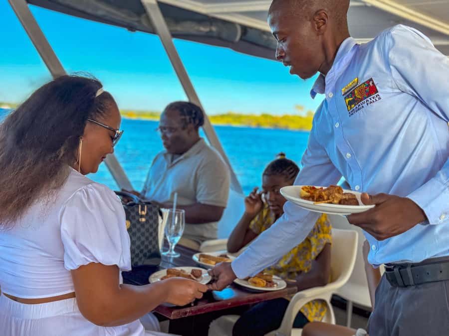 Victoria Falls: Sunset Cruise on the Zambezi River - Boarding the boat on the Zambezi